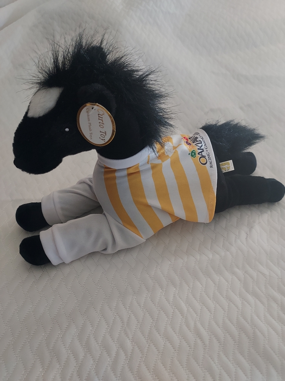 Curto Toy Black Plush Horse with an Oaklawn Yellow Stripe Shirt